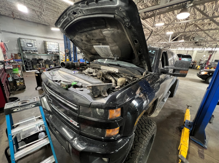 Pickup truck with open hood | Sanderson Auto Repair